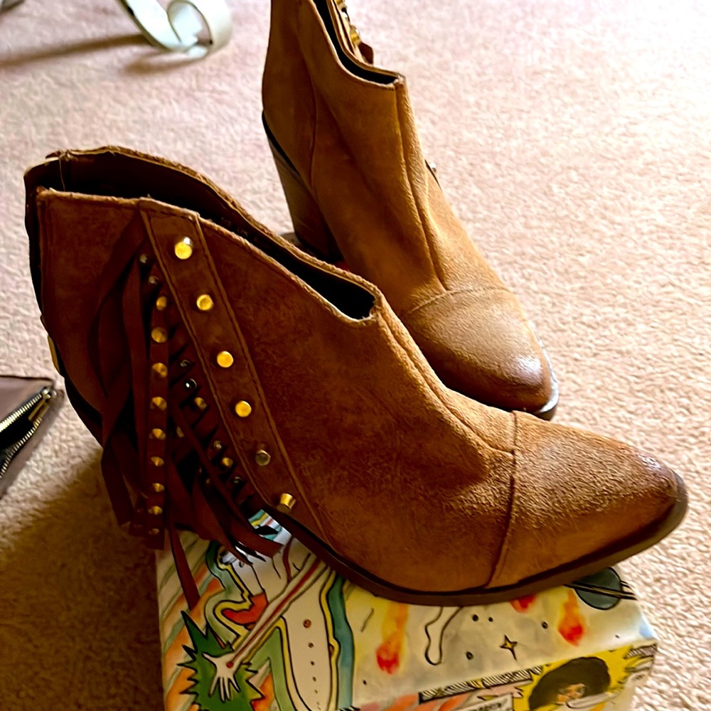 Fergie Fringe Booties. Size 6 and a half. Used but in great condition